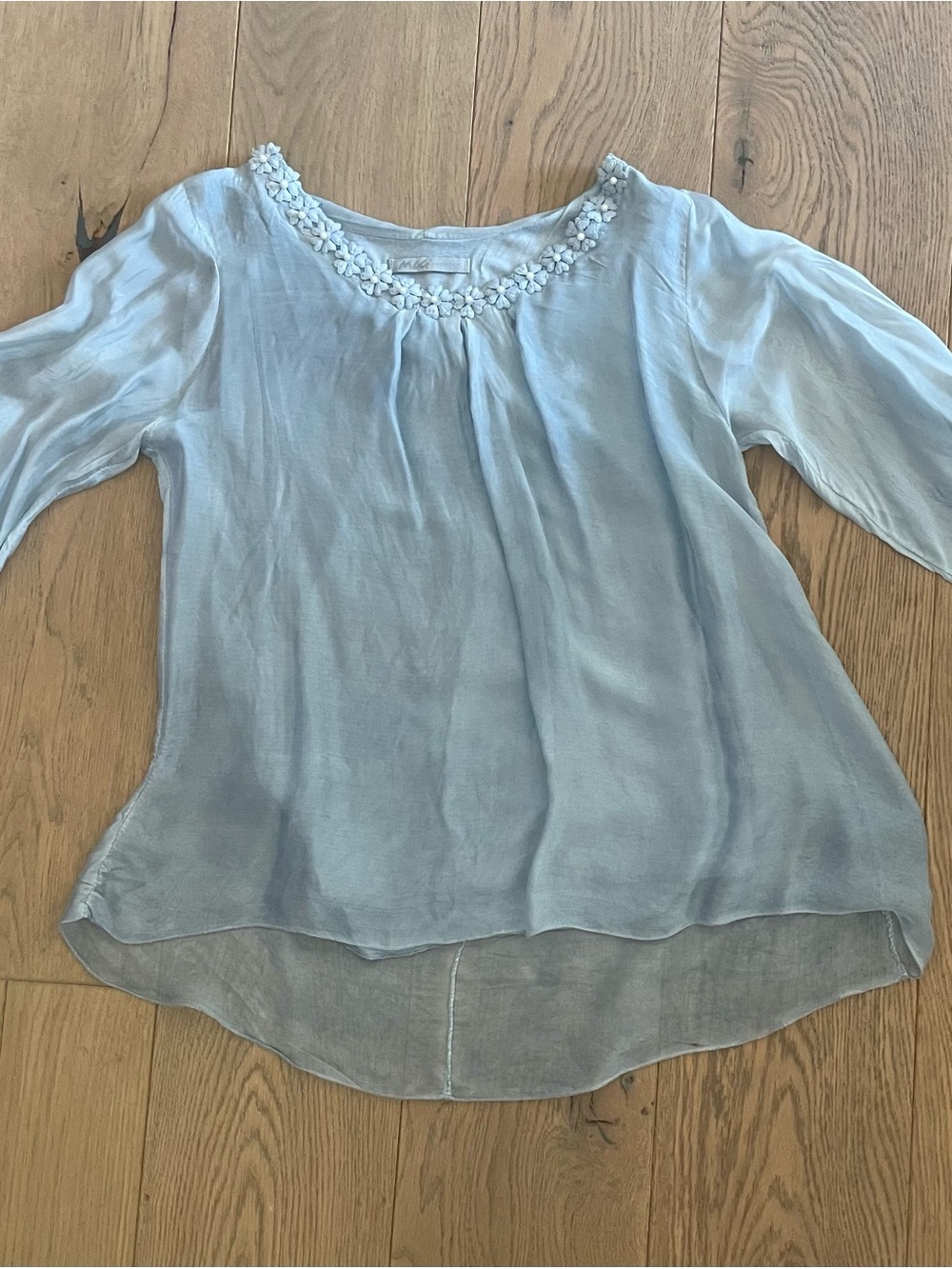 M&G Women's Light Blue Top Embellished with a Floral Neckline